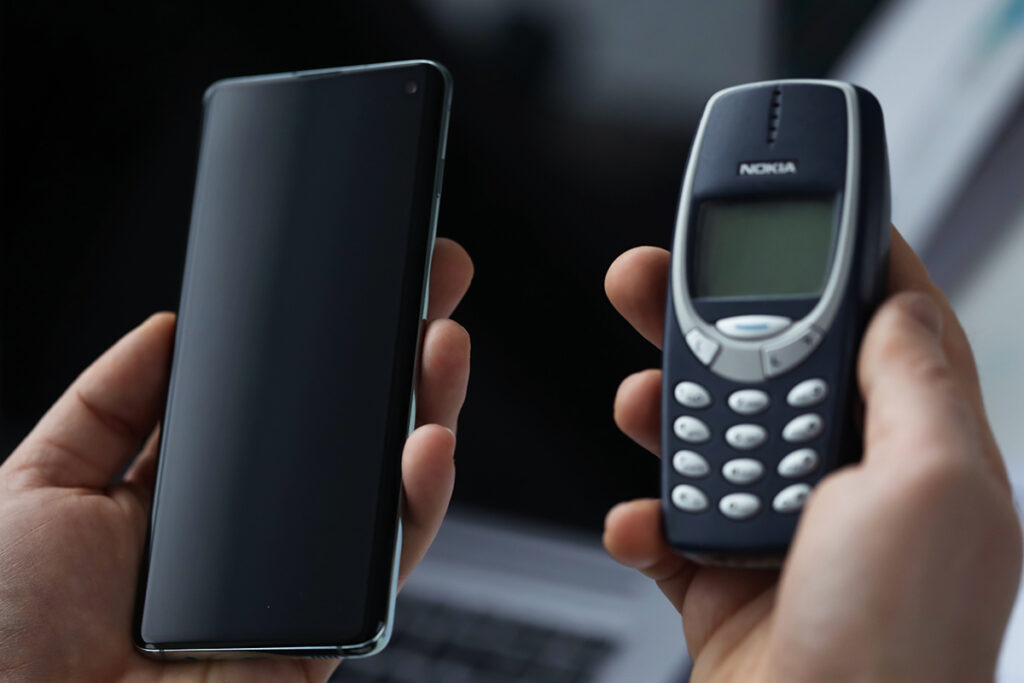 Capa blog-post Do Nokia Tijolão ao iPhone 14: os maiores marcos no avanço da tecnologia telefônica